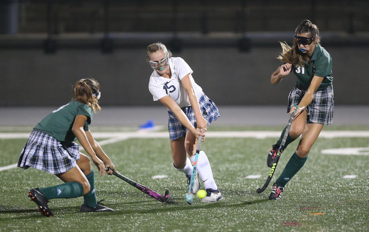 Newport Harbor's Lindsey Blanchfield, pictured between two Edison defenders on Oct. 23, 2018, lifted the Sailors to a 1-0 overtime win in the Tournament of Champions semifinals at Huntington Beach on Thursday.