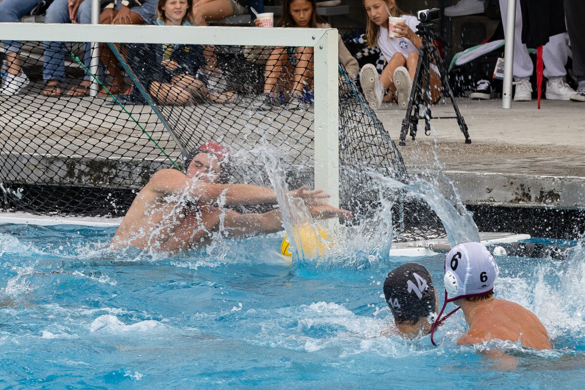 La Jolla goalie Kameron Warren works to block a shot during Bishop's 11-5 water polo victory Oct. 12.