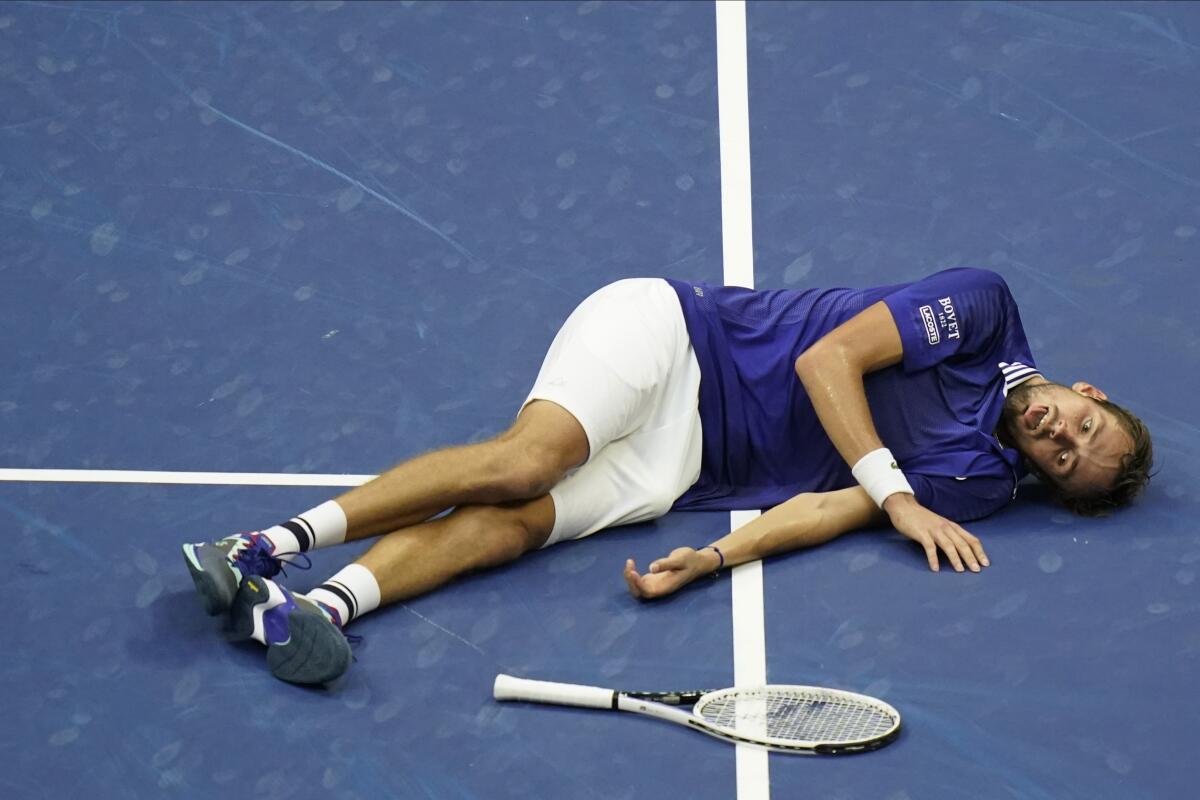 Daniil Medvedev reacts on the court after defeating Novak Djokovic at the U.S. Open on Sunday.