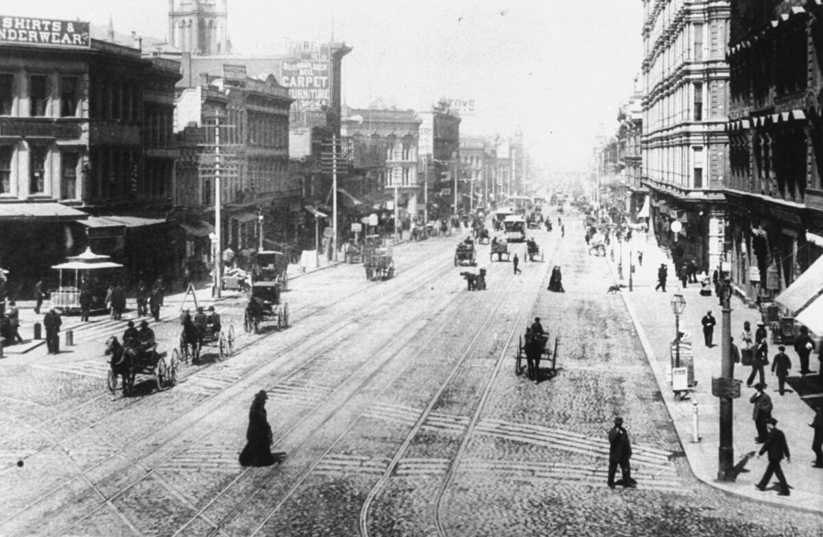 Black and white photo of an old city street