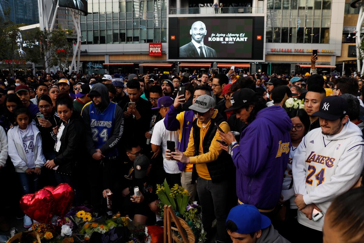 Fans outside Staples Center mourn Kobe Bryant, and daughter Gianna who were among nine killed in a helicopter crash in Calabasas on Jan. 26.