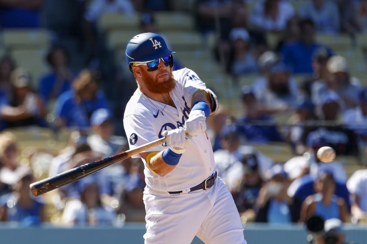 Dodgers third baseman Justin Turner bats against the Arizona Diamondbacks in September.