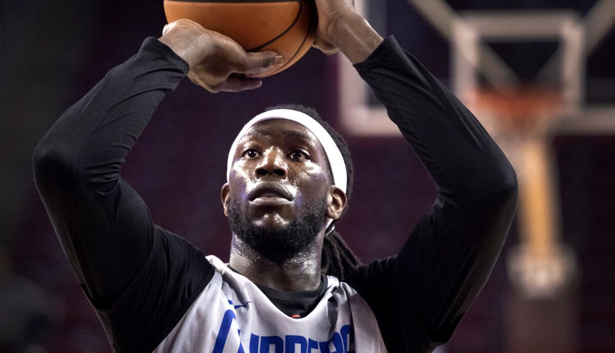 Clippers power forward Montrezl Harrell shoots a free throw during a practice at USC's Galen Center earlier this month.