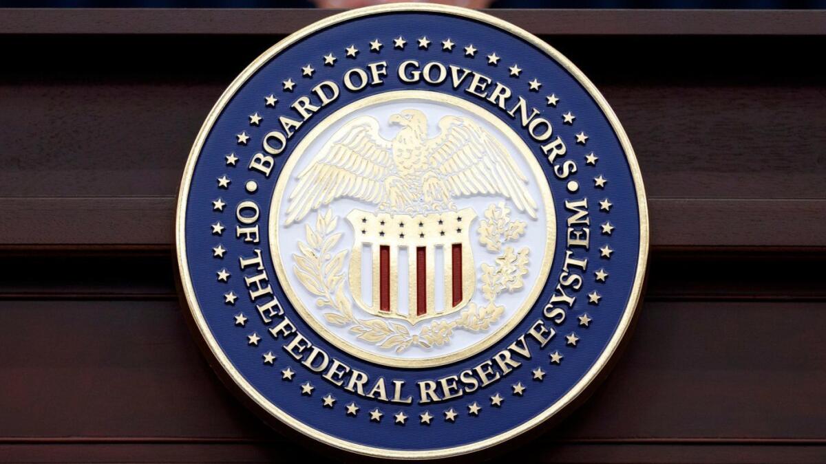 The Federal Reserve is pursuing a series of interest rate hikes and a reduction in its bond holdings.