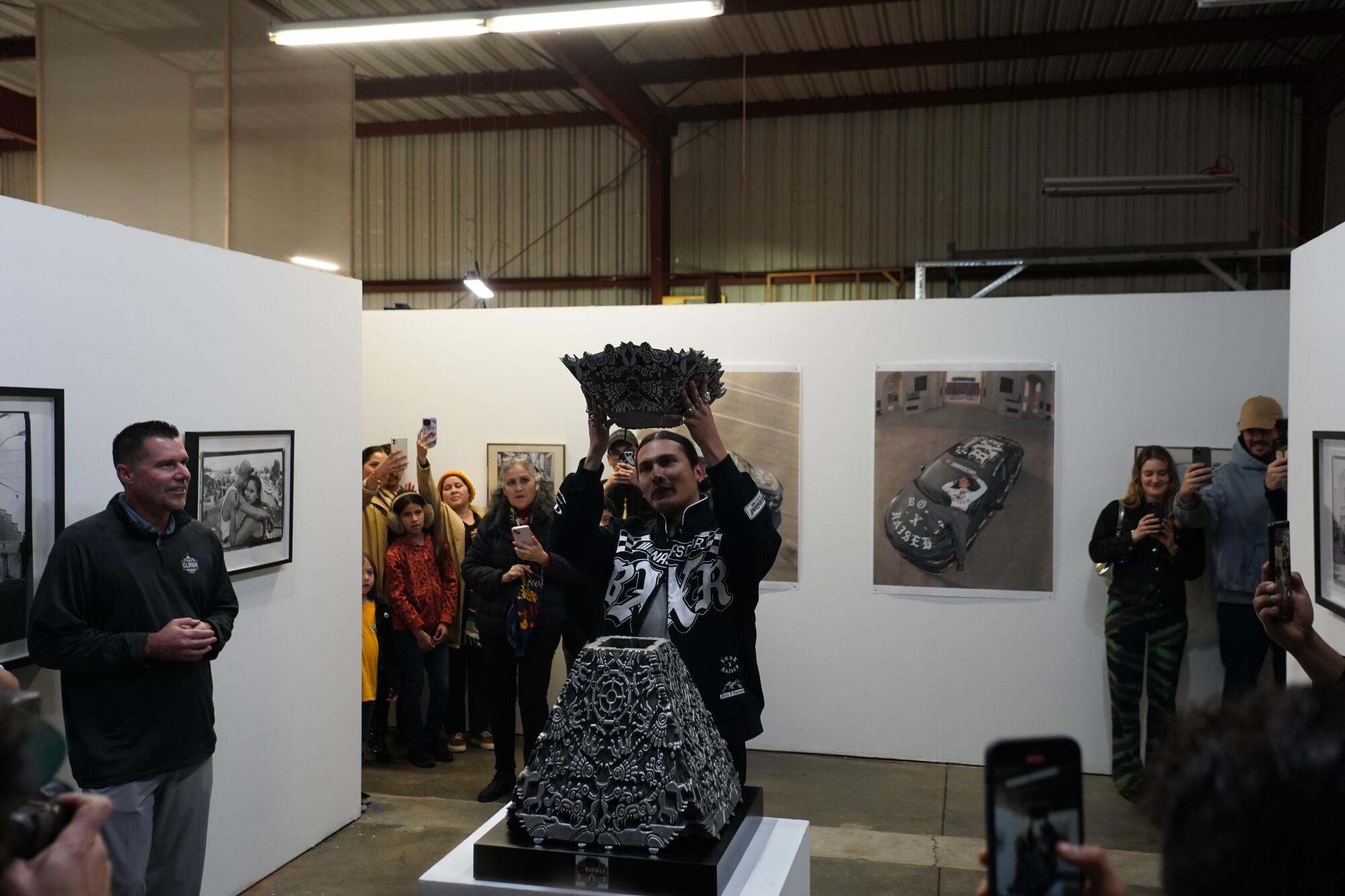 Artist Ozzie Juarez at the trophy unveiling at Tlaloc Studios.