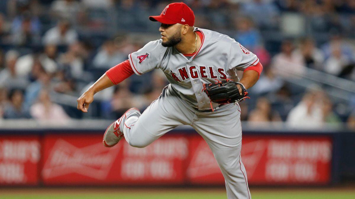 Angels relief pitcher Yusmeiro Petit follows through on a pitch against the New York Yankees on June 22.