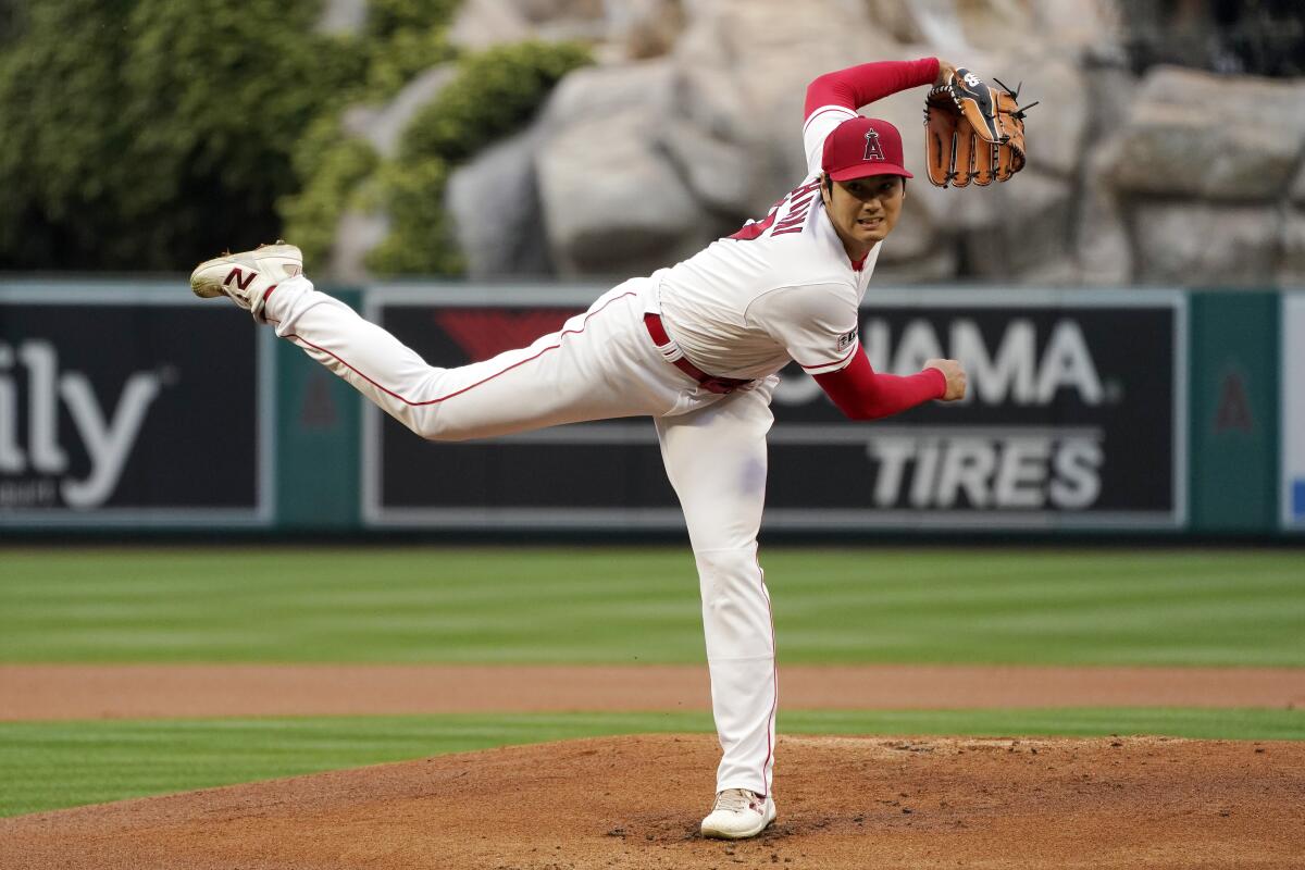 Los Angeles Angels starting pitcher Shohei Ohtani throws to the plate during the first inning.