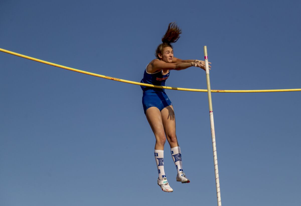 Westlake's Paige Sommers touches the bar in the pole vault