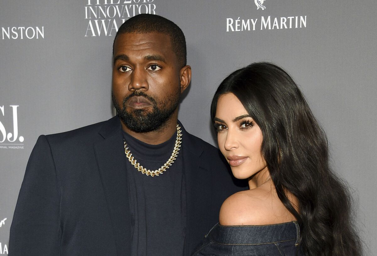 FILE - Kanye West, left, and Kim Kardashian attend the WSJ. Magazine Innovator Awards on Nov. 6, 2019, in New York. Kardashian became a single woman on Wednesday, nearly eight years after her marriage to Ye, who legally changed his name from Kanye West. (Photo by Evan Agostini/Invision/AP, File)