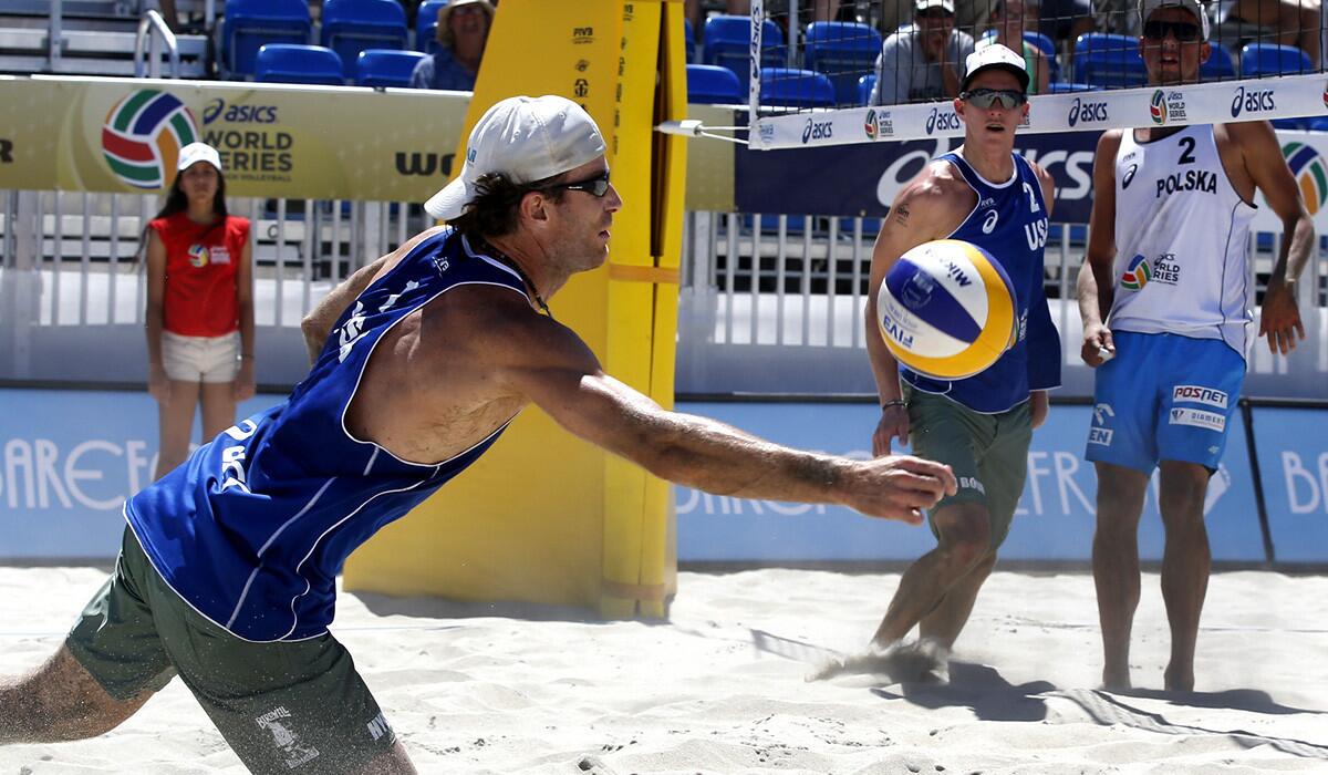 John Hyden digs a shot during a match at the Asics World Series of Beach Volleyball tournament on Thursday in Long Beach.