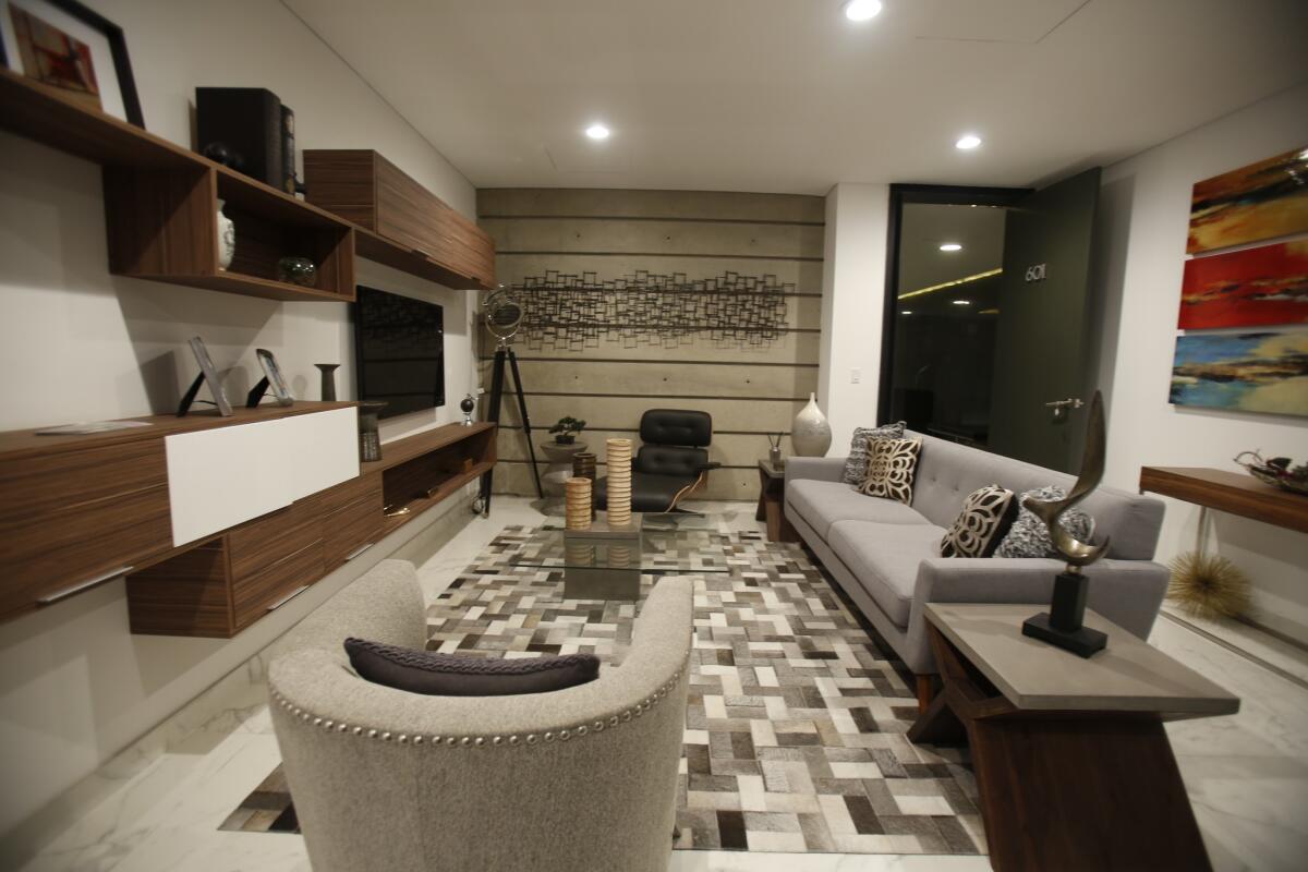 Cosmopolitan Residences will be a 42-unit tower in Colonia Cacho. Inside their showroom floor.