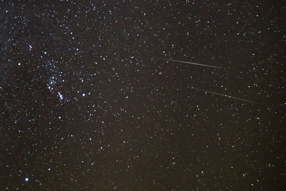 A double meteor flash from a previous Geminid meteor shower.
