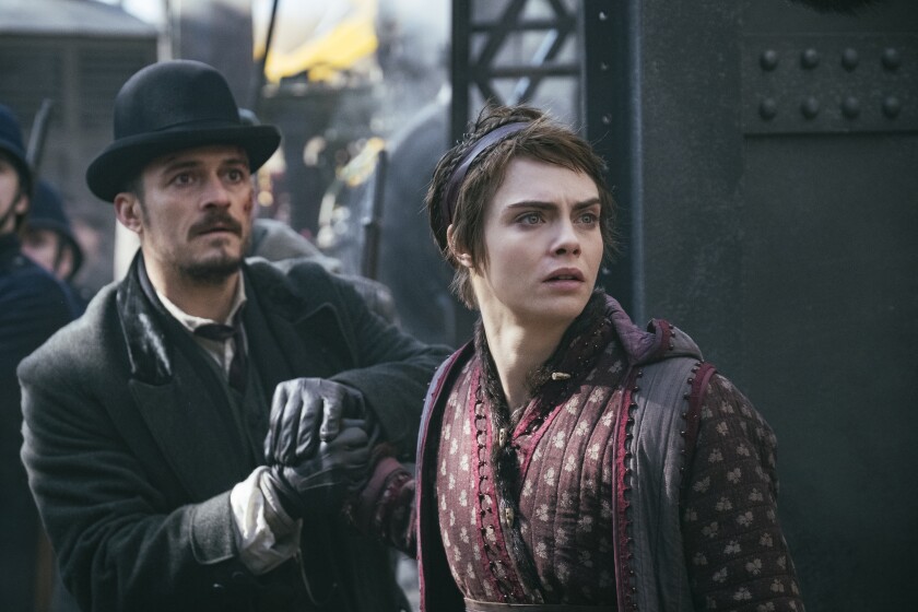 Orlando Bloom and Cara Delevingne in “Carnival Row”
