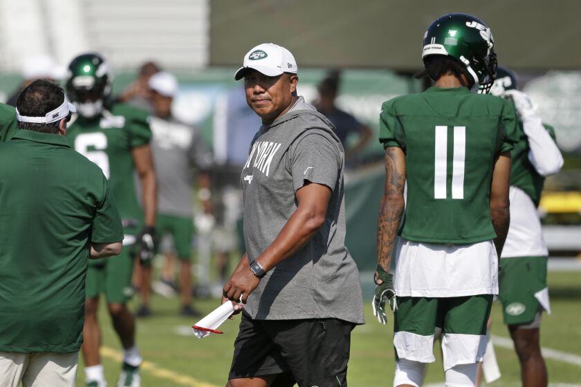 FILE - Hines Ward, at the time the New York Jets' offensive assistant coach, walks on the field during the NFL football team's training camp in Florham Park, N.J., July 25, 2019. Ward is getting his first opportunity to be a head coach with San Antonio in the new XFL. The league relaunches in February 2023. (AP Photo/Seth Wenig, File)