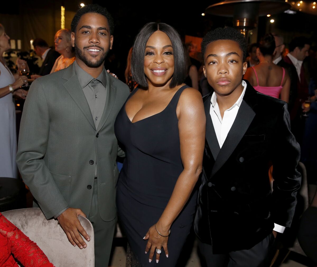 Jharrel Jerome, from left, Niecy Nash and Asante Blackk, Emmy nominees from "When They See Us," attend a Television Academy reception Sept. 20.