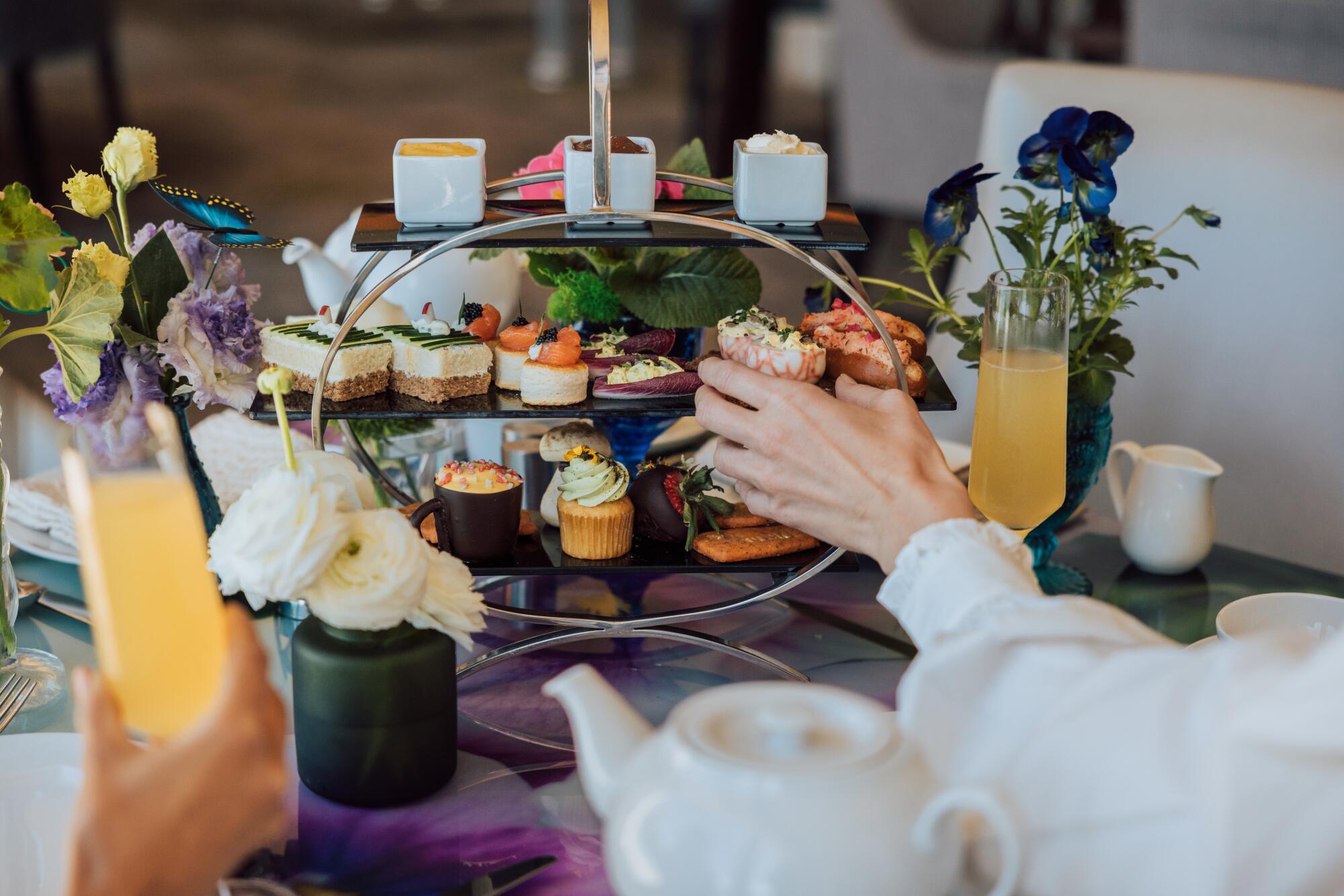Afternoon tea service at the Ritz-Carlton, Laguna Niguel includes a menu of tea sandwiches and sweets.