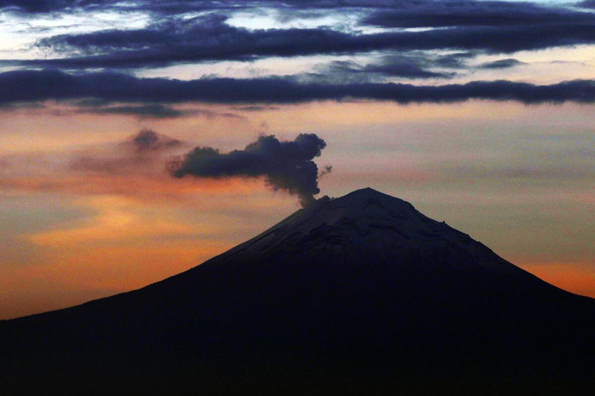 Plume of ash and steam rising from Popocatepetl volcano near Mexico City