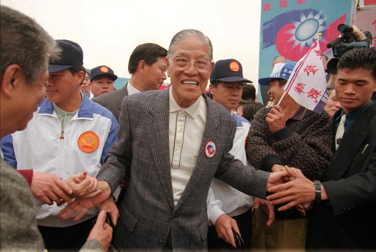 President Lee Teng-hui is congratulated on his reelection at a celebration rally in Taipei, Taiwan, in 1996.
