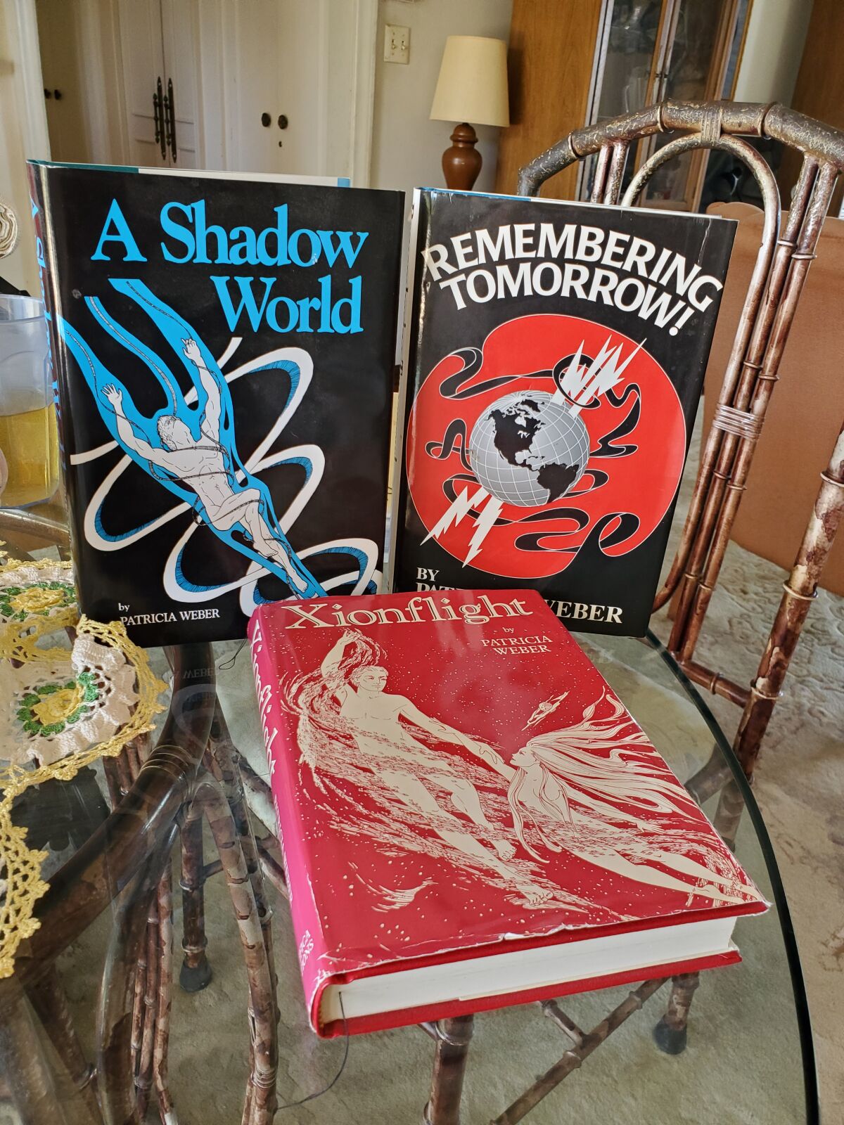 Patricia Weber's novels are "A Shadow World," "Remembering Tomorrow!" and "Xionflight."