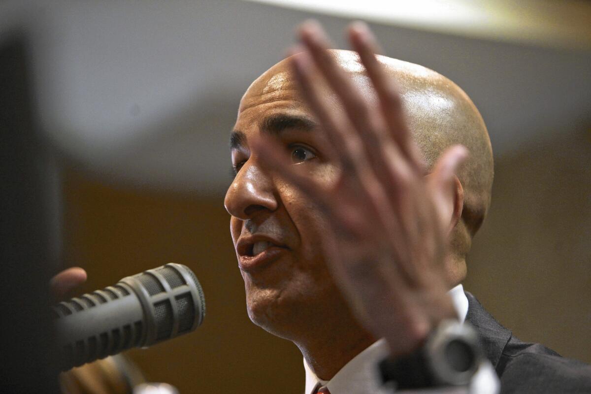 Neel Kashkari makes a point during the debate. He put another $1 million of his own money into the campaign Friday.