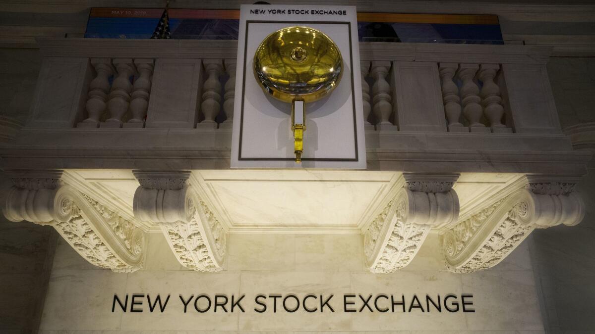 The opening bell hangs above the trading floor at the New York Stock Exchange.