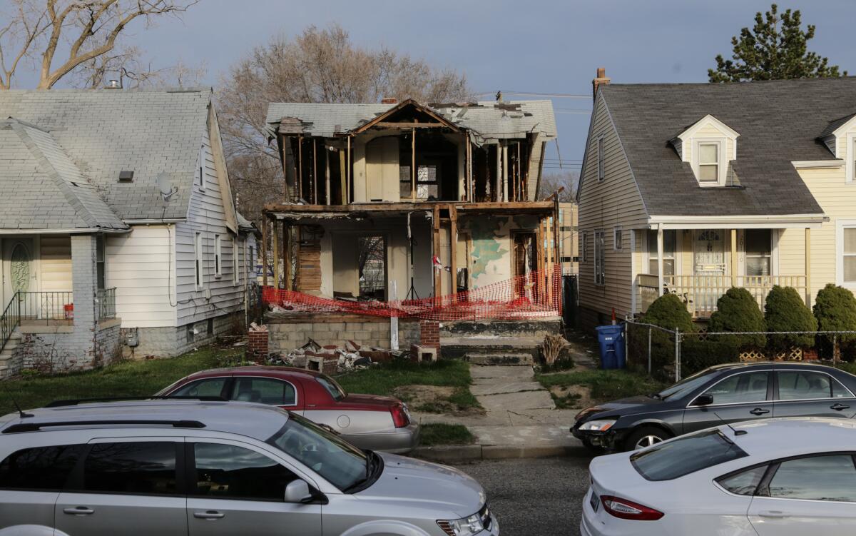 The remains of a home partially employed by artist Ryan Mendoza for an installation in Europe. Neighbors have taken issue with the way the demolition has been handled.