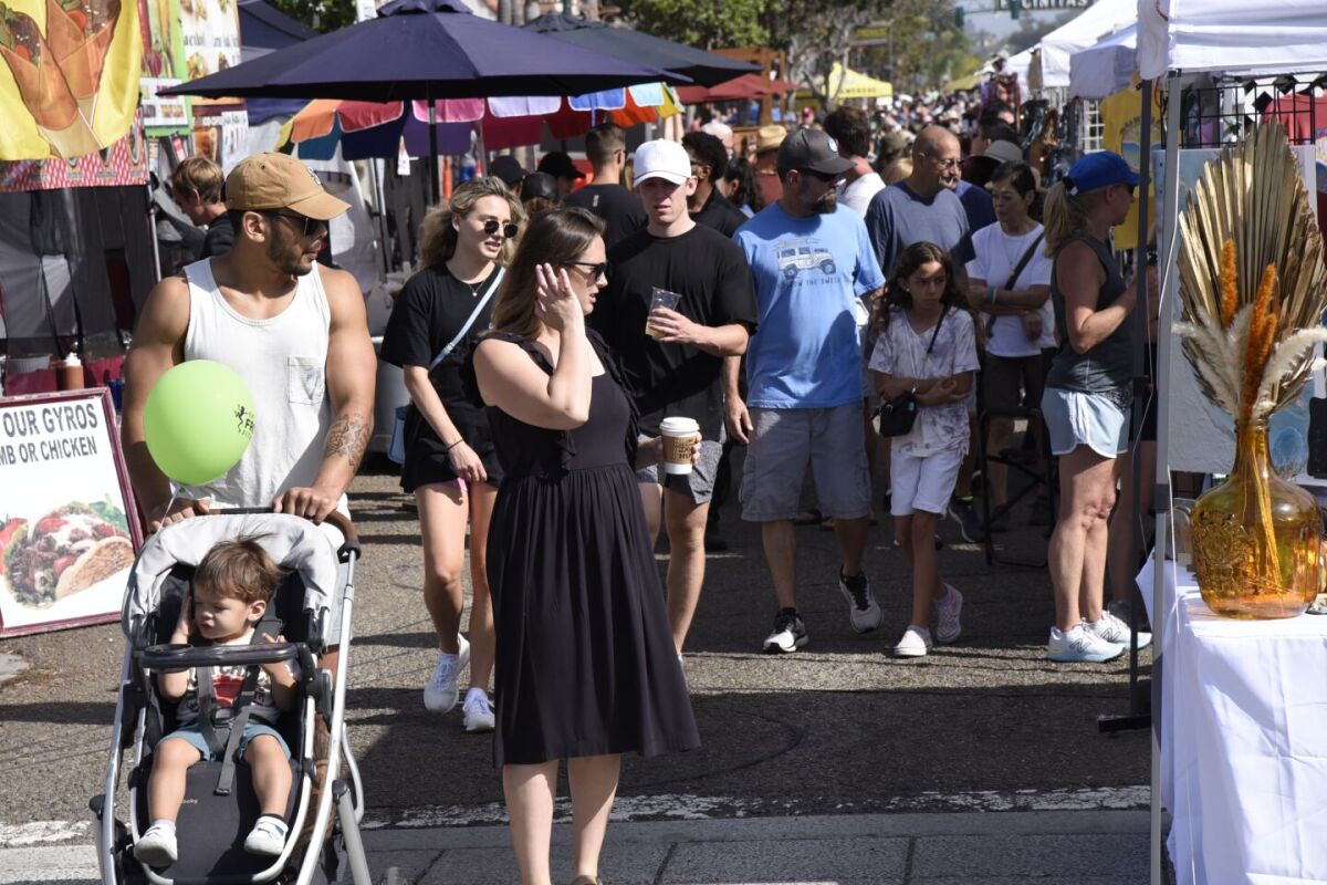 Attendees enjoying last year’s Encinitas Spring Street Fair.