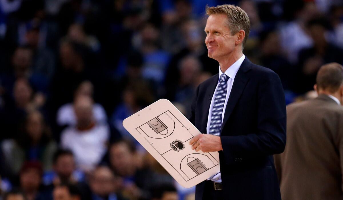 Golden State Warriors head coach Steve Kerr stands on the side of the court during a time out against the Indiana Pacers on Friday.