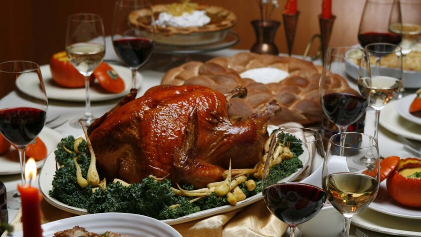 The cost to feed 10 Thanksgiving guests got cheaper this year.