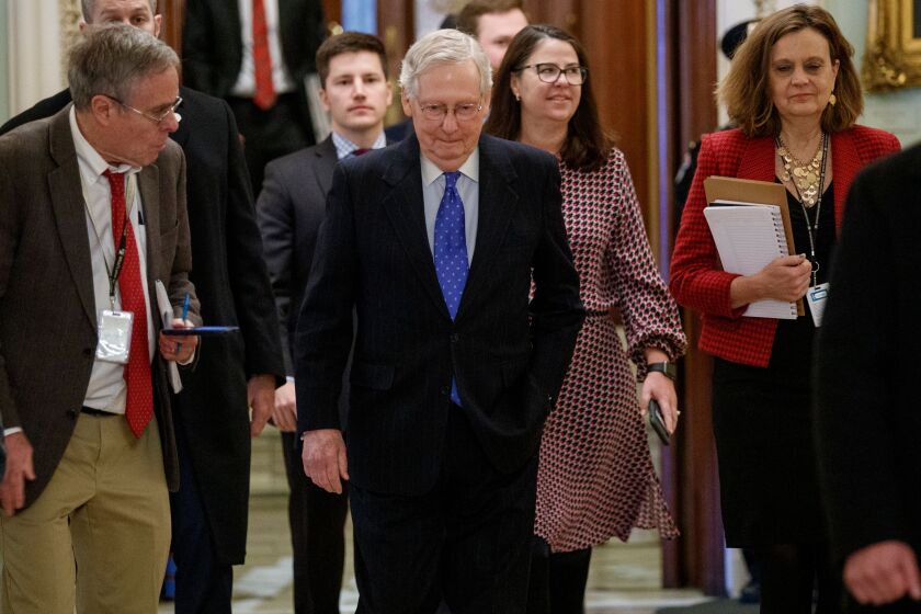 Mandatory Credit: Photo by SHAWN THEW/EPA-EFE/REX (10509707a) Senate Majority Leader Mitch McConnell (C) walks to his office after delivering remarks on the Senate Floor in the US Capitol in Washington, DC, USA, 19 December 2019. The house has voted to impeachment US President Donald J.Trump for abuse of power and obstruction of Congress. The Senate is expected to start its impeachment trial in January 2020. Senate Majority Leader Mitch McConnell on impeachment, Washington, USA - 19 Dec 2019 ** Usable by LA, CT and MoD ONLY **