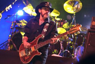 INDIO, CA - APRIL 13, 2014: Motorhead's Lemmy on stage for day three of the Coachella Valley Music and Arts Festival April 13, 2014 in Indio. (Brian van der Brug / Los Angeles Times)