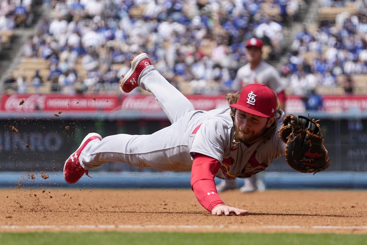 St. Louis Cardinals first baseman Brendan Donovan makes a catch on a hit by Miguel Vargas during the fourth inning.