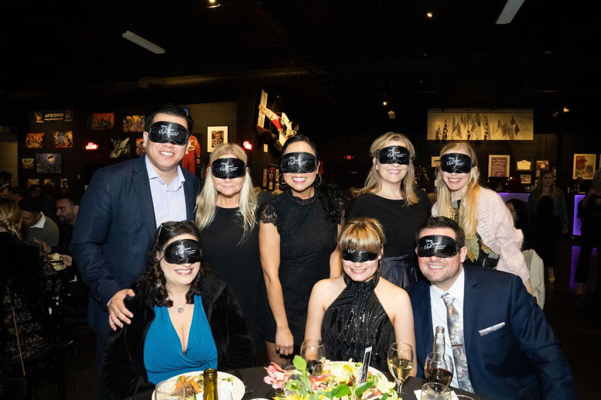 Guests at Beyond Blindness’ Vision Beyond Sight Gala enjoy a blindfolded dining experience.