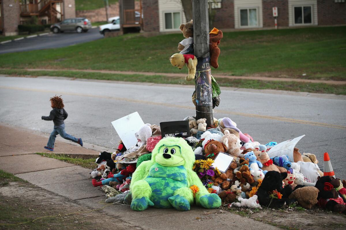 A memorial for Michael Brown remains on Canfield Street in Ferguson, Mo., where police Officer Darren Wilson killed Brown on Aug. 9.
