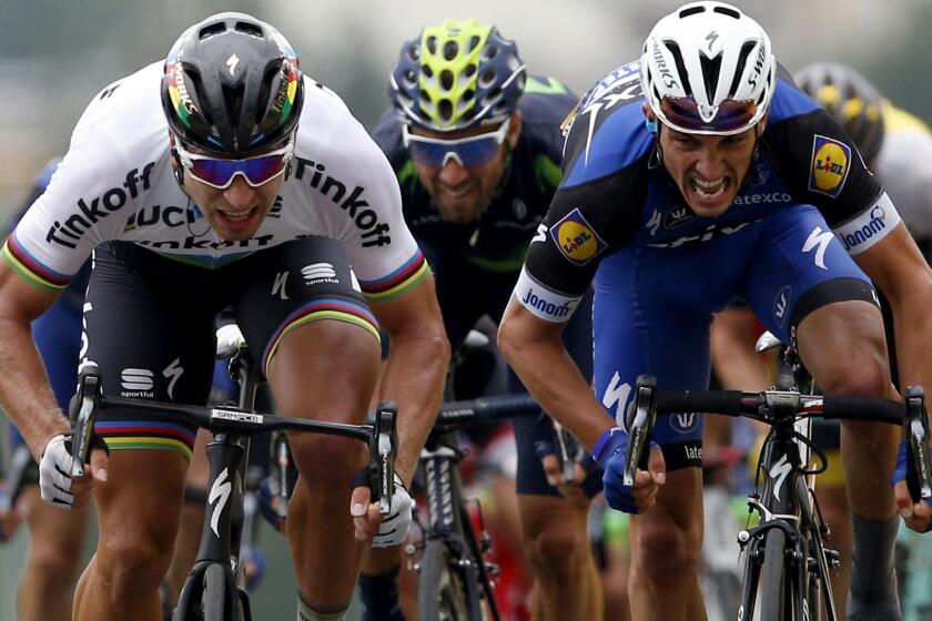 Peter Sagan edges Julian Alaphilippe to win the second stage of the Tour de France on Sunday.