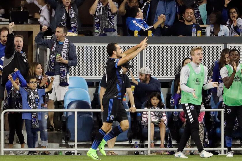 FILE - In this June 24,2017, file photo, San Jose Earthquakes forward Marco Urena, center, celebrates his goal against Real Salt Lake during the second half of an MLS soccer match, in San Jose, Calif. Los Angeles Football Club (LAFC)chose Urena in the Major League Soccer expansion draft, Tuesday, Dec. 12, 2017. (AP Photo/Marcio Jose Sanchez)