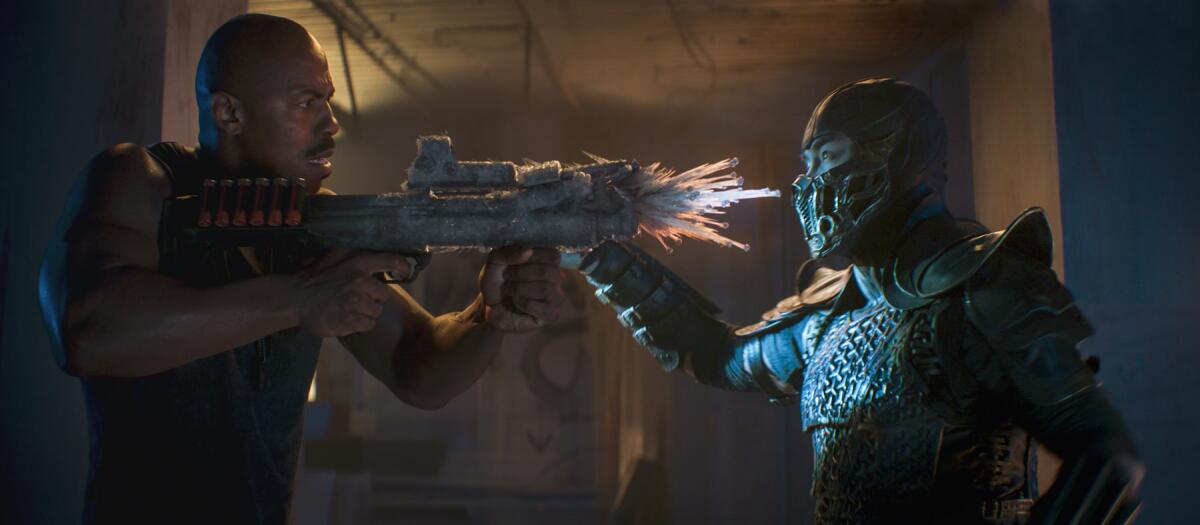 Joe Taslim as Sub-Zero with Mehcad Brooks as Jax in a scene in "Mortal Kombat."