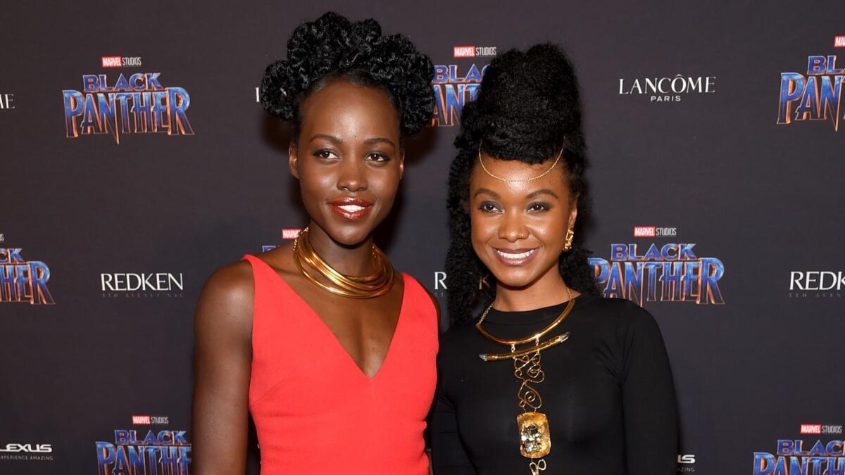 Lupita Nyong'o and jewelry designer Douriean Fletcher attend Marvel Studios' "Welcome to Wakanda" showcase at Industria Studios in New York during New York Fashion Week on Feb. 12.