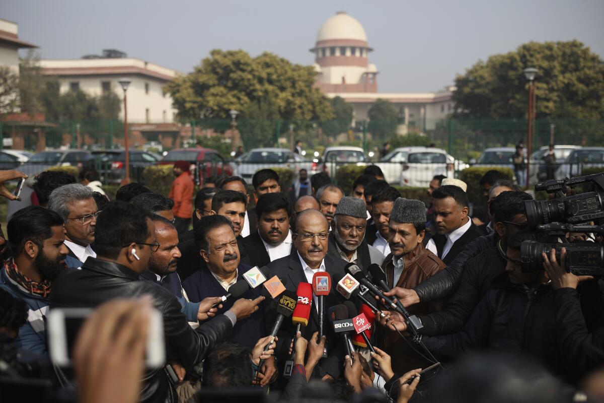 Indian Union Muslim League leader P. K. Kunhalikutty, one of the petitioners, speaks Jan. 22 on the lawn of India's Supreme Court.