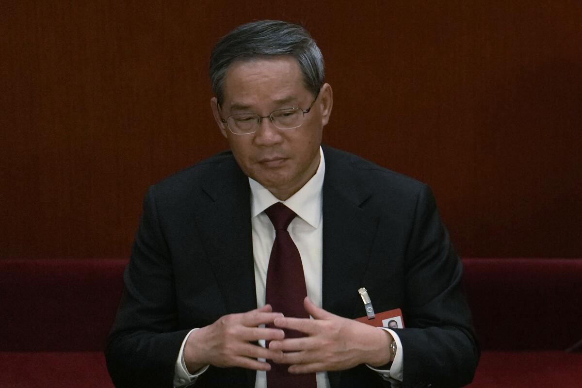 Li Qiang, miembro del Comité Permanente del Buró Político, asiste al Congreso Nacional del Pueblo 