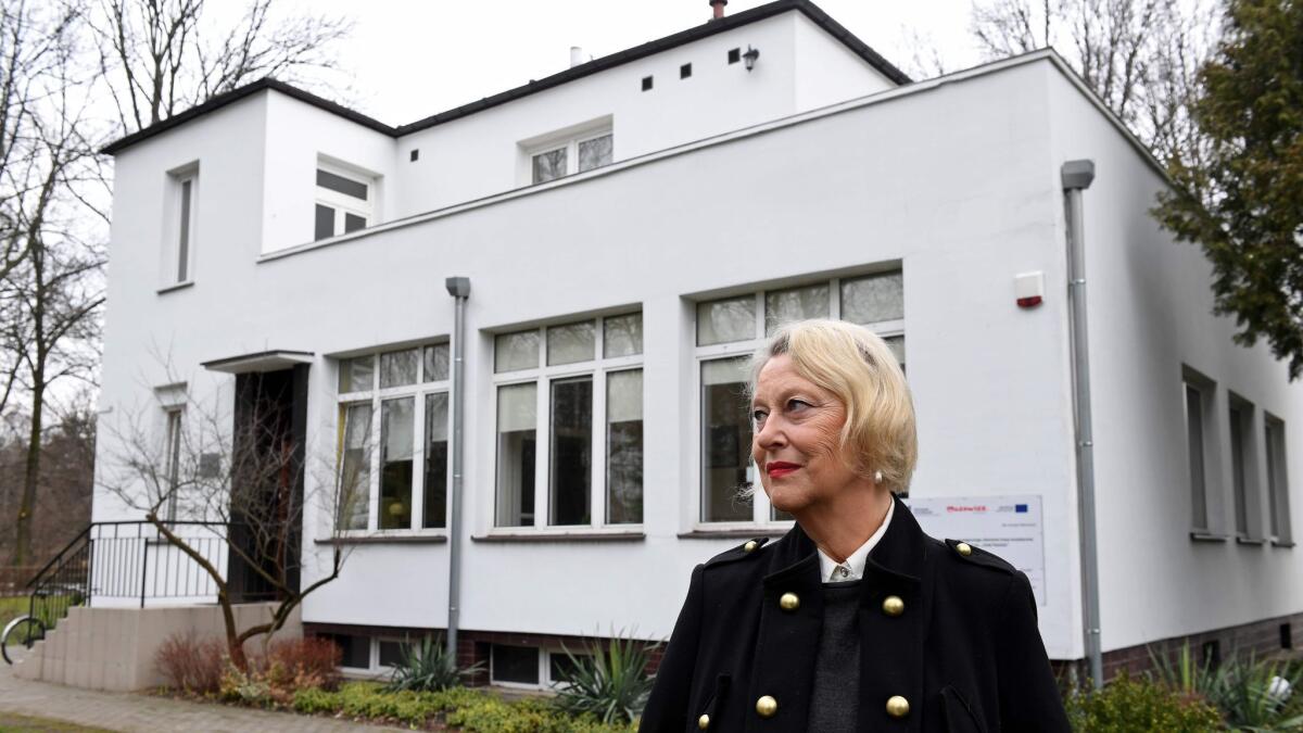 Teresa Zabinska, daughter of Jan and Antonina Zabinski, in front of the Zabinski's Warsaw villa. In the villa's basement, accessed with a secret tunnel to the garden, the Zabinskys hid nearly 300 Jews and resistance fighters on zoo grounds during most of World War II.