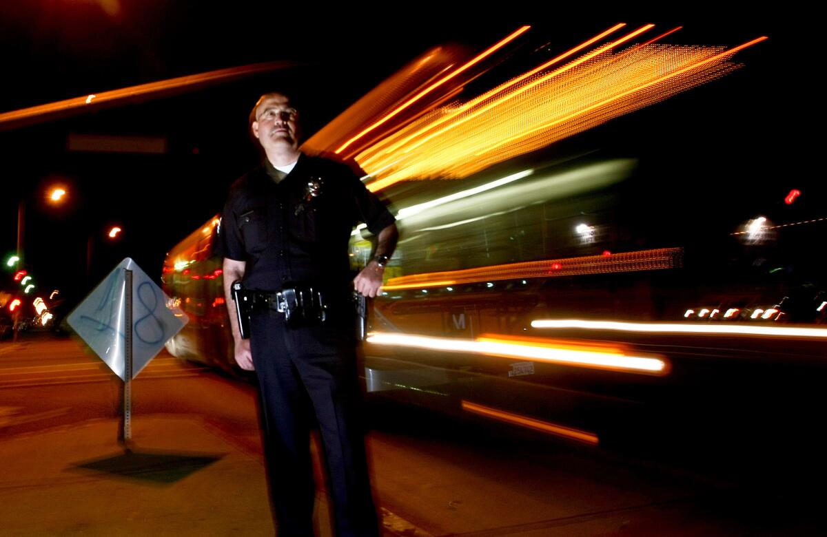 LAPD Sgt. Rick Arteaga is is photographed at Vermont Avenue and Manchester Boulevard in South Los Angeles, the same intersection he was working the day the riots broke out on April 29, 1992. Arteaga, who's stationed in the 77th Street Division, has been with the department since 1989.