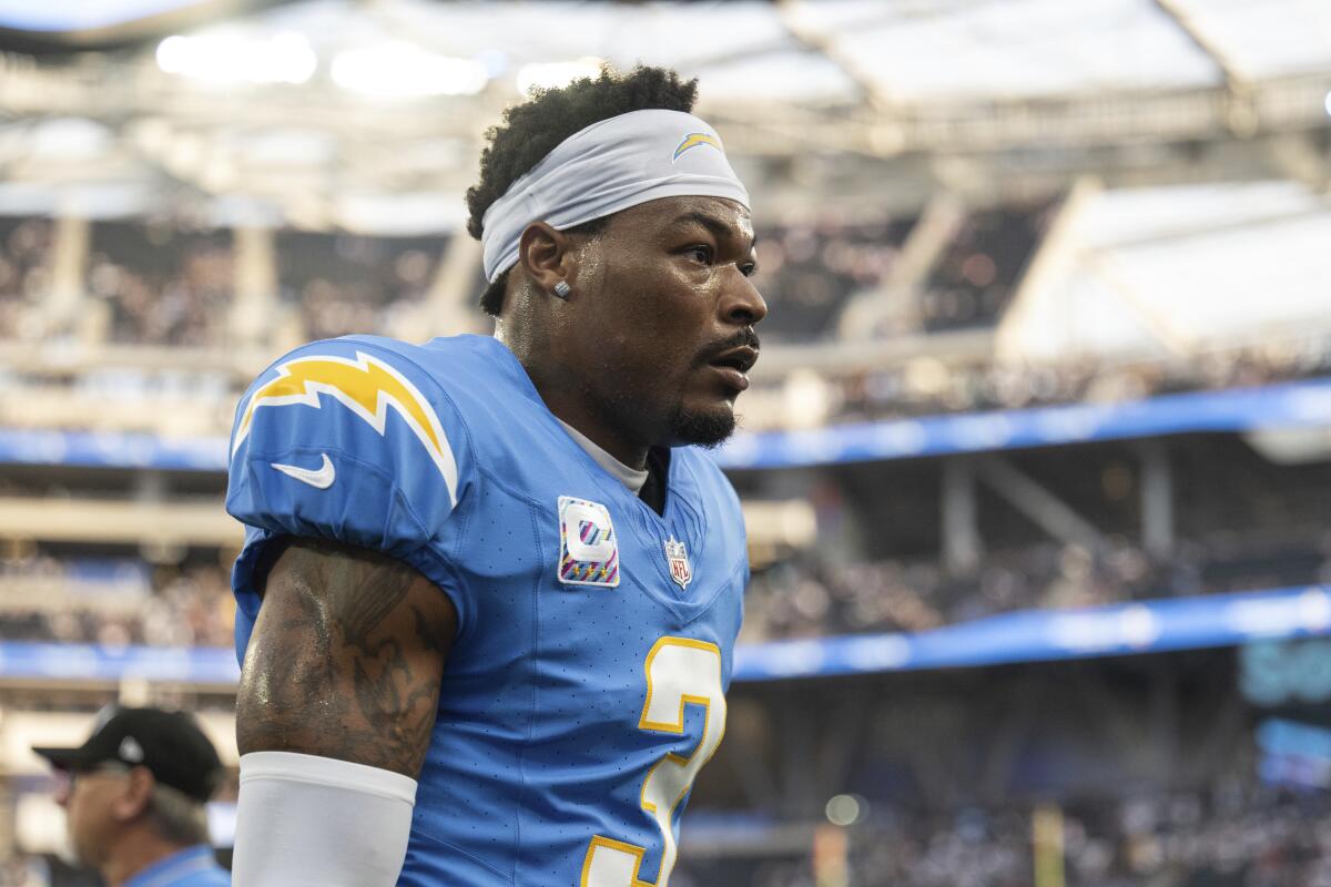 Chargers safety Derwin James Jr. walks on the field before a loss to the Dallas Cowboys on Oct. 16.