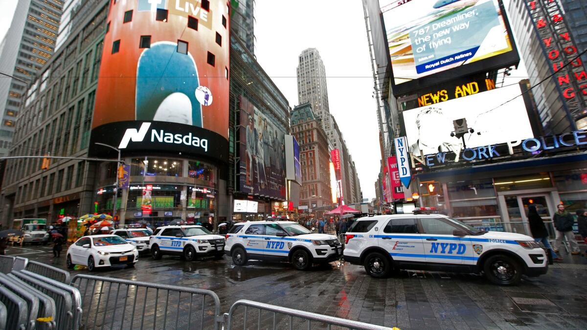 Police cars in Times Square on Thursday.