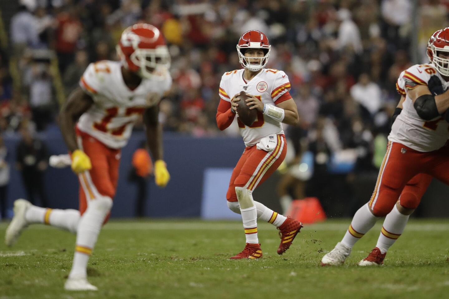 Chiefs quarterback Patrick Mahomes looks to pass during the first half of a game against the Chargers on Nov. 18 at Estadio Azteca in Mexico City.