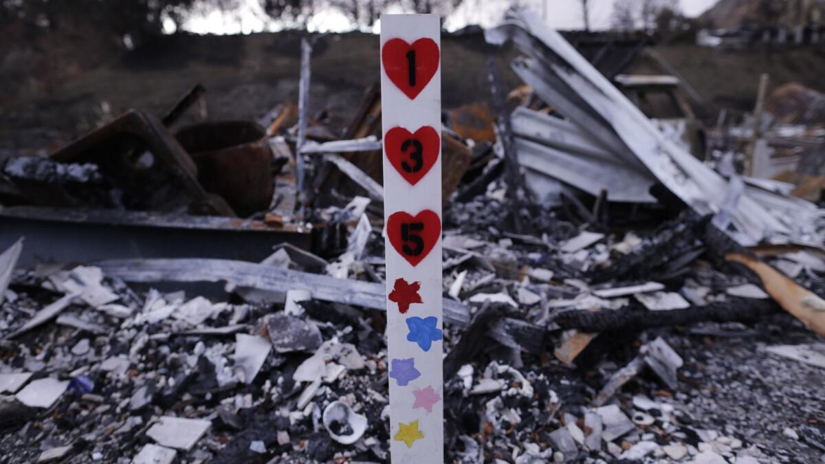 A space marker was all that remained of a mobile home in Agoura Hills destroyed in the Woolsey fire. California residents have until Friday to apply for federal aid to help with losses suffered in a string of wildfires in November.
