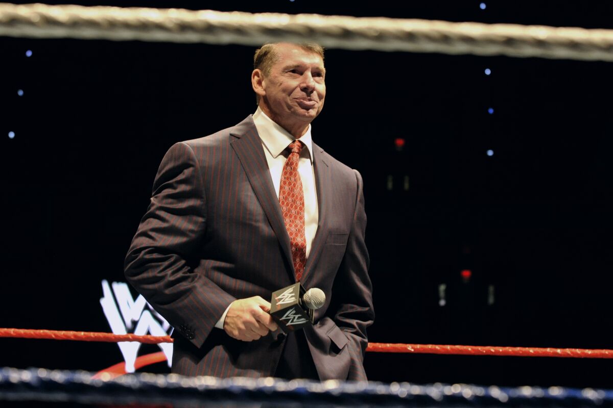 WWE chairman and CEO Vince McMahon speaks to an audience