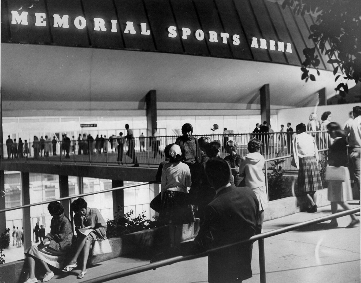 In this undated photo, an overflow crowd assembles outside the Sports Arena to listen over loud speakers as an unknown program takes place inside for a capacity crowd.