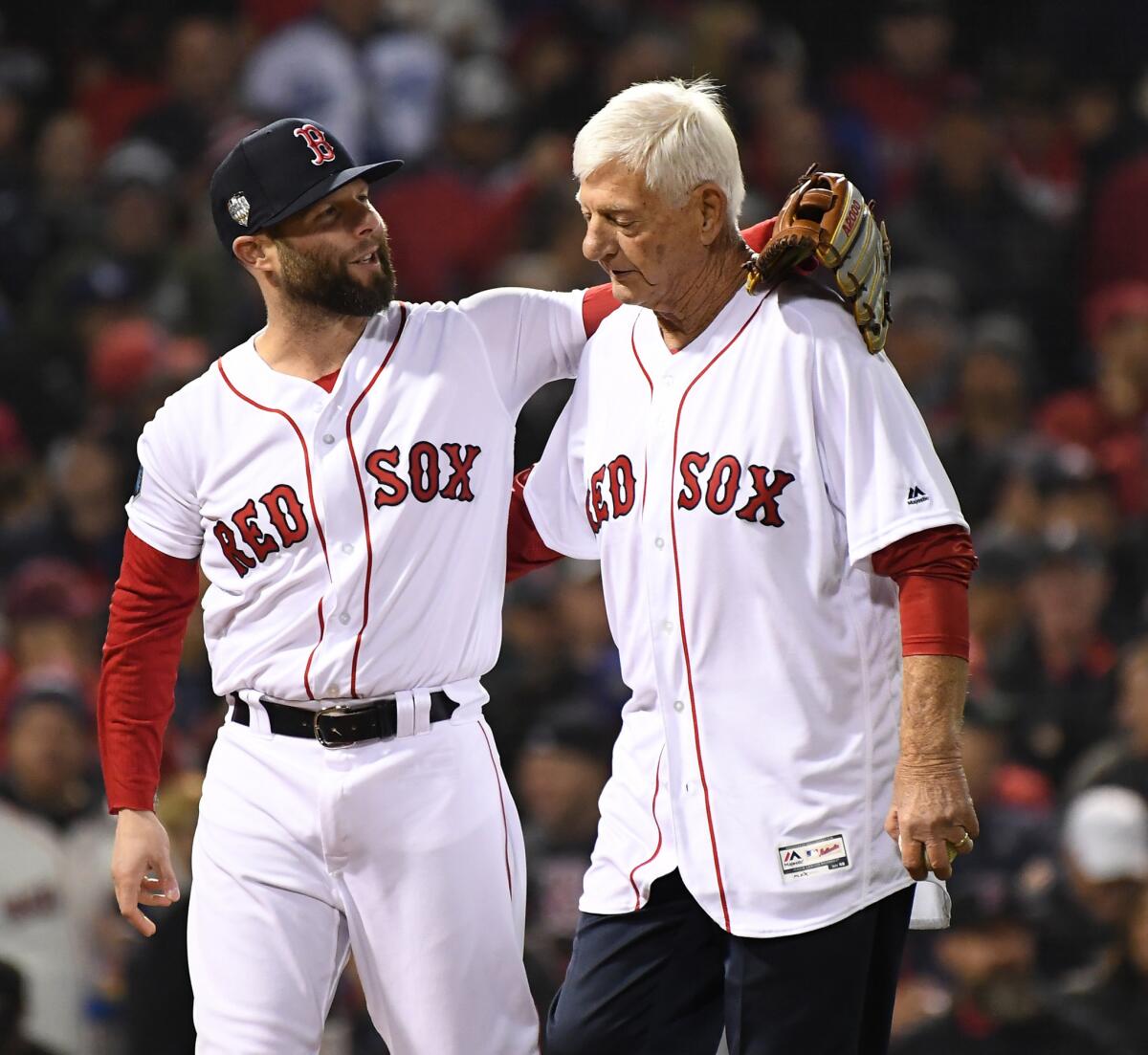 Boston Red Sox legend Carl Yastrzemski, right, with longtime Red Sox star Dustin Pedroia after throwing out the first pitch before the start of Game 1.