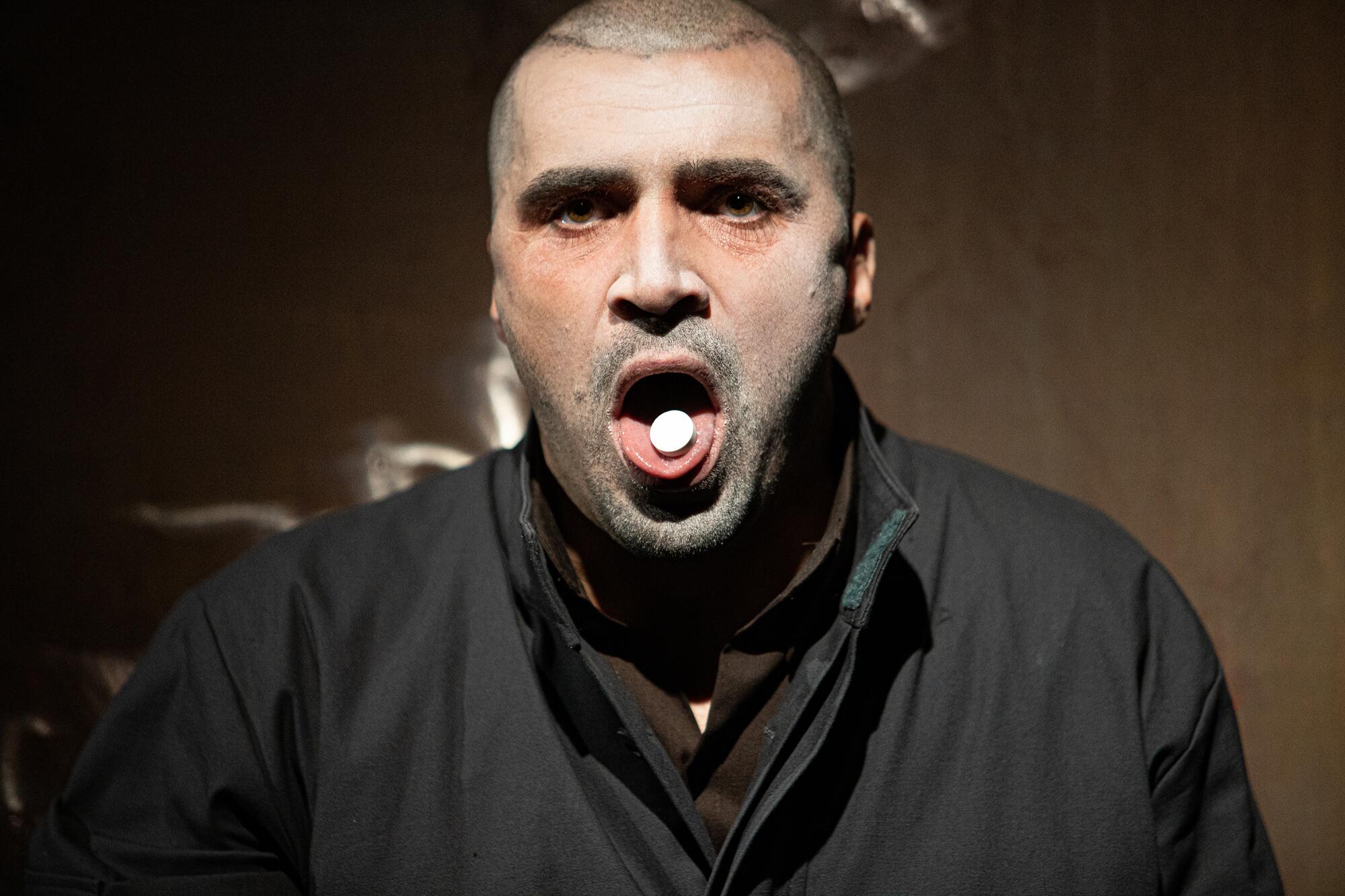 A man with his mouth wide open